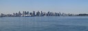 A panorama of the many skyscrapers of downtown Vancouver as seen from a
tower by Lonsdale Quay.  The trees at the far right are one edge of Stanley
Park.  Excellent. View full-sized image.
